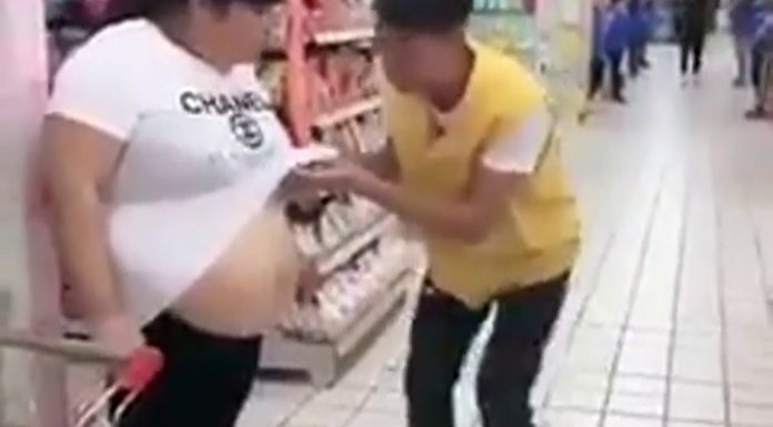 WHAT’S SHE HIDING?