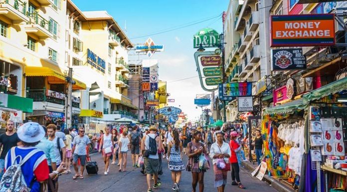 OUT WITH THE BACKPACKERS IN WITH THE CHINESE