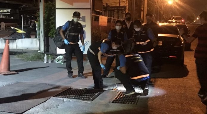 Gambler accused of shooting two at massage parlour